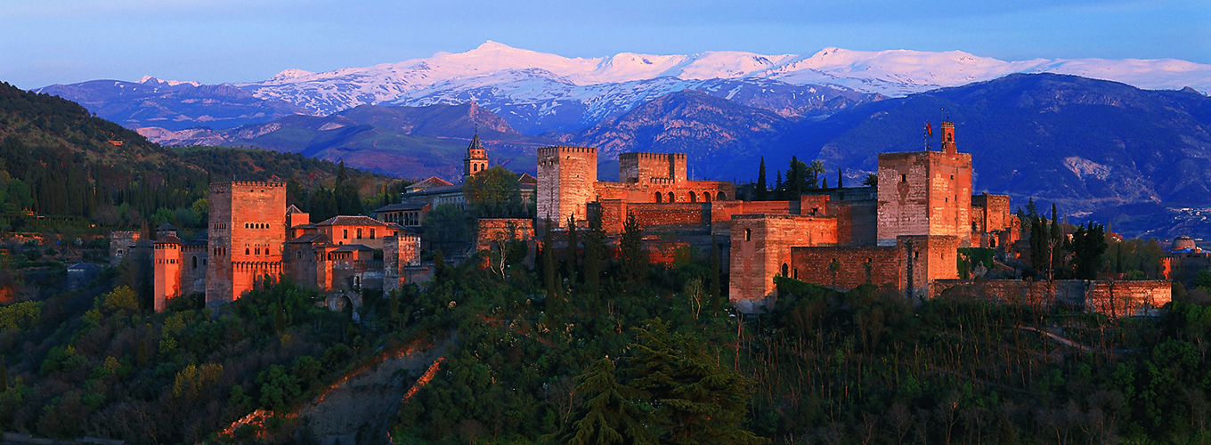 Alhambra Palace of Granada and the Sierra Nevada at sunset